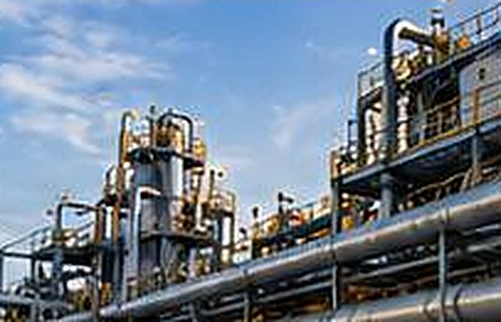 Pipe racks and process modules at an oil and gas facility